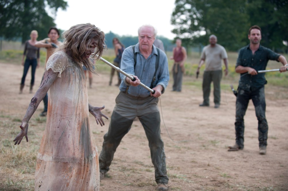 (Foreground) Hershel Greene (Scott Wilson) - (Background L-R) Andrea (Laurie Holden), Glenn (Steven Yeun), Lori Grimes (Sarah Wayne Callies), Carol (Melissa Suzanne McBride), T-Dog (Robert 'IronE' Singleton) and Rick Grimes (Andrew Lincoln) - The Walking Dead - Season 2, Episode 7 - Photo Credit: Gene Page/AMC