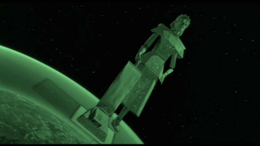 Mega Maid in outer space transforming from vacuum to blower in Spaceballs, parodying the idea that narratives can reverse direction with a switch.